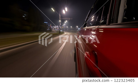 Drivelapse urban look from fast driving car at a night avenue in a city timelapse hyperlapse Drivelapse urban look from fast driving car at a night avenue in a city timelapse hyperlapse 122323405