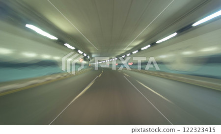 Road and tunnel on the Palm Jumeirah island in Dubai at night, UAE timelapse Road and tunnel on the Palm Jumeirah island in Dubai at night, UAE timelapse 122323415