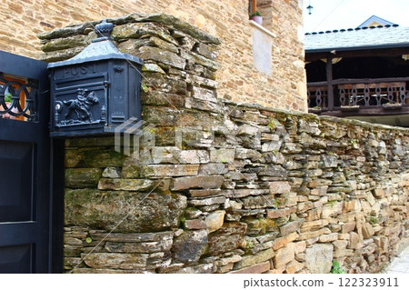 Portomarin, a town on the pilgrimage route to Camino (Santiago pilgrimage) Portomarin, a town on the pilgrimage route to Camino (Santiago pilgrimage) 122323911