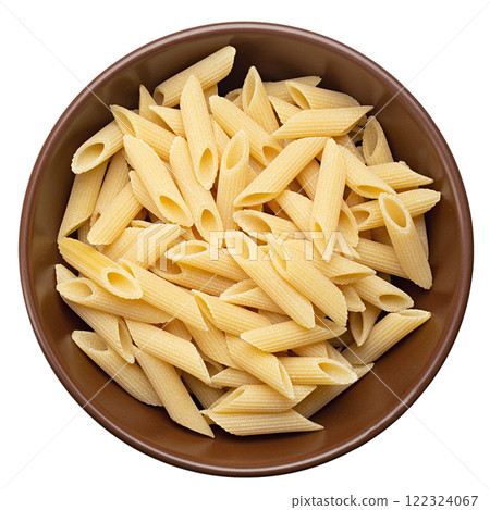 Pennette rigate. Raw pasta in a plate isolated on white background. Top view. Pennette rigate. Raw pasta in a plate isolated on white background. Top view. 122324067