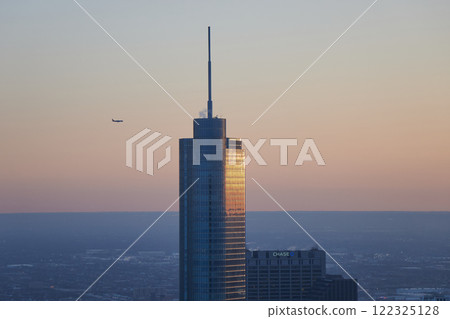 Chicago cityscape at sunset, view from Chicago 360 skyscrapers in Chicago, Illinois, USA 122325128