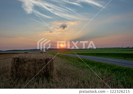Landscape. Evening landscape in the field. Winding road. Landscape. Evening landscape in the field. Winding road. 122326215
