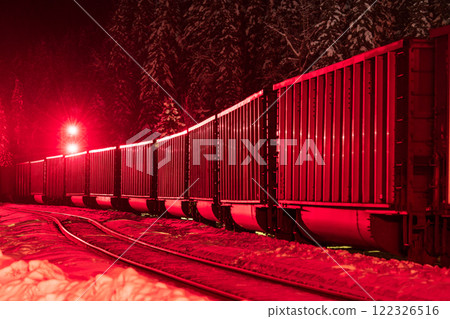 A freight train (freight car) illuminated in the dark 122326516