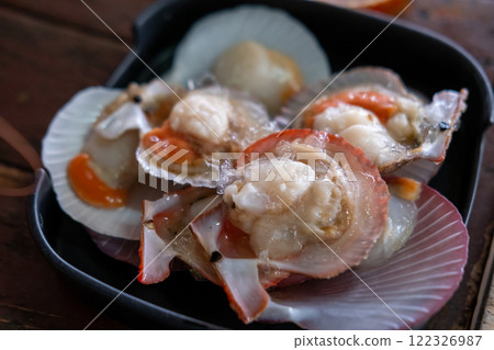 Raw scallop prepared on the plate 122326987