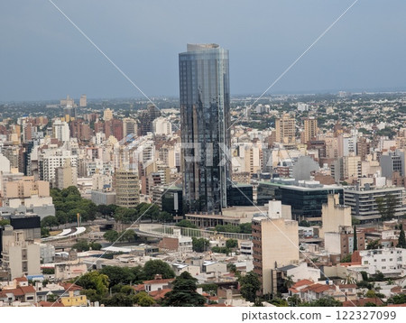 Panoramic view of the city from the tower of the Cardinales Cofico complex. Reflections on a building after rain 122327099