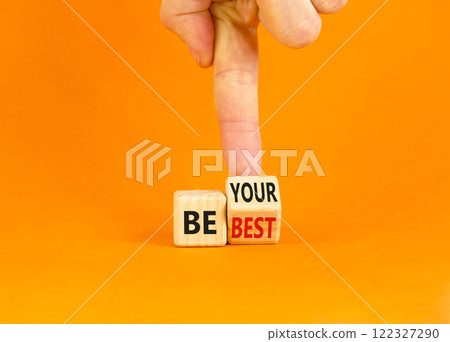 Motivational be your best symbol. Concept words Be your best on beautiful wooden block. Beautiful orange background Businessman hand. Business motivational be your best concept. Copy space. Motivational be your best symbol. Concept words Be your best on beautiful wooden block. Beautiful orange background Businessman hand. Business motivational be your best concept. Copy space. 122327290