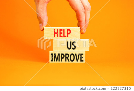 Help us improve symbol. Concept words Help us improve on beautiful wooden blocks. Beautiful orange background. Businessman hand. Business motivational help us improve concept. Copy space. Help us improve symbol. Concept words Help us improve on beautiful wooden blocks. Beautiful orange background. Businessman hand. Business motivational help us improve concept. Copy space. 122327310