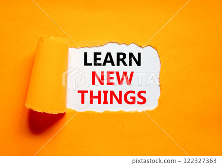 Learn new things symbol. Concept words Learn new things on beautiful white paper. Beautiful orange table orange background. Business motivational learn new things concept. Copy space. Learn new things symbol. Concept words Learn new things on beautiful white paper. Beautiful orange table orange background. Business motivational learn new things concept. Copy space. 122327363