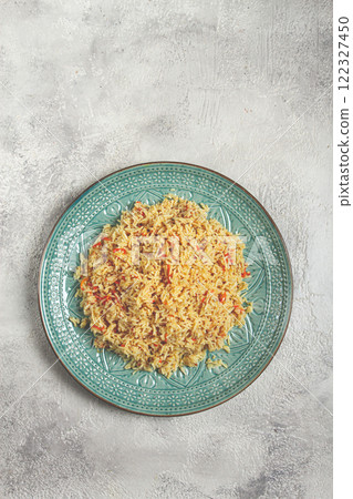 basmati rice with saffron, on a decorative blue plate, light background, homemade, no people, 122327450