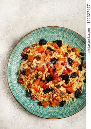 rice dish with dried fruits, nuts and spices of Middle Eastern cuisine, homemade, no people, rice dish with dried fruits, nuts and spices of Middle Eastern cuisine, homemade, no people, 122327477
