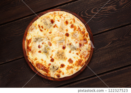 Freshly baked cheese pizza, with a golden crust and bubbling melted cheese, white pizza, on a wooden board, homemade, no people, 122327523