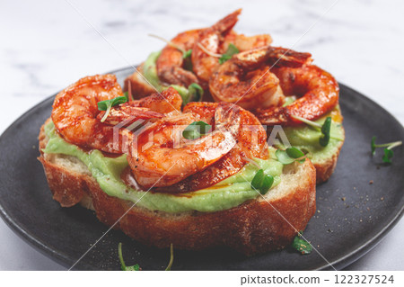 sandwiches with avocado and caramelized shrimp, micro-greens, breakfast, on a plate, top view, homemade, no people, 122327524