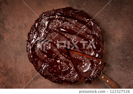 chocolate cake, round cake, on a brown background, top view, homemade cakes, no people, chocolate cake, round cake, on a brown background, top view, homemade cakes, no people, 122327526