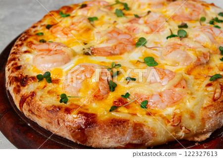 four cheese pizza with shrimp and fresh microgreens, served on a wooden board, homemade, no people, 122327613