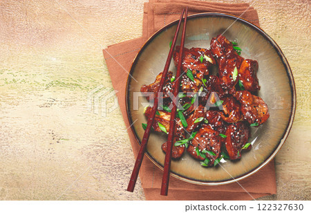 yakitori chicken kebab, on a plate, with green onions and sesame seeds, top view, no people, yakitori chicken kebab, on a plate, with green onions and sesame seeds, top view, no people, 122327630