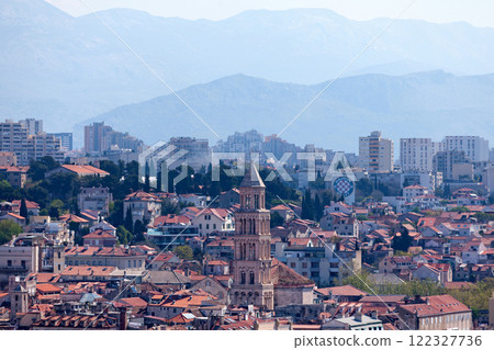 Bell tower of Saint Domnius Cathedral in Split with the Mosor mountains behind Bell tower of Saint Domnius Cathedral in Split with the Mosor mountains behind 122327736
