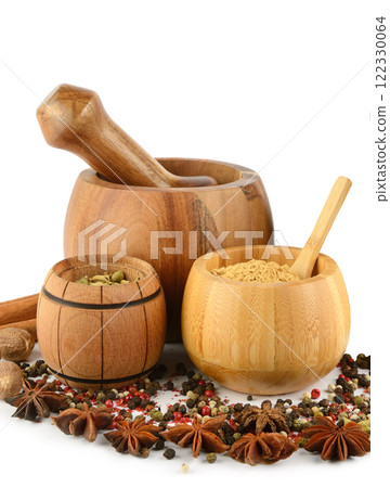 mortar, pestle and spice set isolated on white background. Free space for text. 122330064