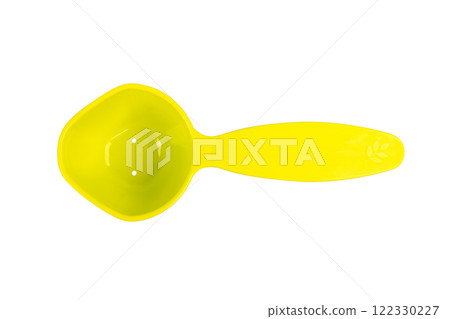 Green measuring spoon isolated on white background 122330227