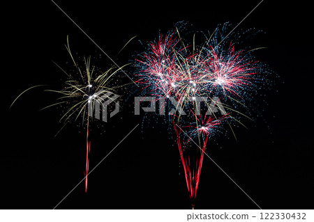 Colorful fireworks lights on the night sky background 122330432