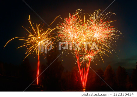 Colorful fireworks lights on the night sky background 122330434