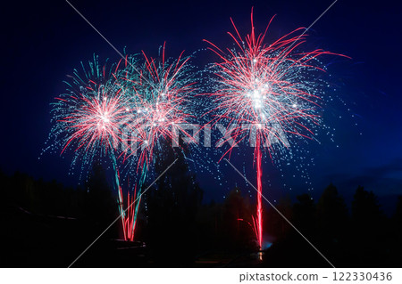Colorful fireworks lights on the night sky background 122330436