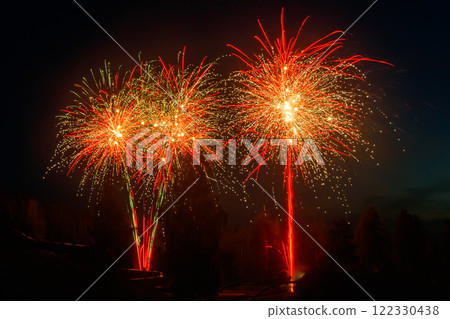Colorful fireworks lights on the night sky background 122330438