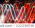 Abstract blurred colorful light effect on a black background. Long exposure photo of moving camera. 122330536