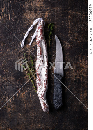 Salami sausage fuet with spice Salami sausage fuet with spice 122330659
