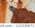 Rust and old, falling paint on the iron bridge structure. 122330671