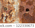 Rust and old, falling paint on the iron bridge structure. 122330673