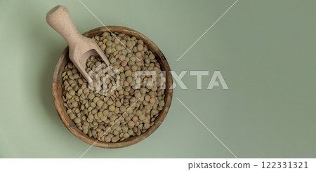 Raw green lentil Gluten free cereals. Health gut benefits. Concept of alternative whole spelt grain ingredient. Vegetarian diet recipes. Plant-based lifestyle. Copy space Protein rich 122331321