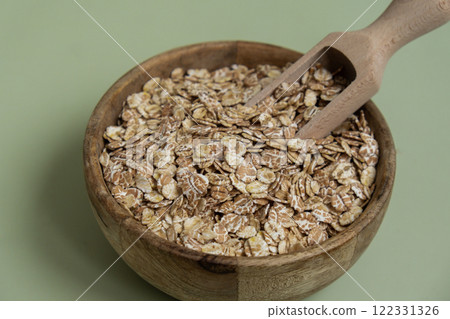 Raw oatmeal porridge Gluten free cereals. Health gut benefits. Concept of alternative whole spelt grain ingredient. Vegetarian diet recipes. Plant-based lifestyle. Copy space Protein rich Raw oatmeal porridge Gluten free cereals. Health gut benefits. Concept of alternative whole spelt grain ingredient. Vegetarian diet recipes. Plant-based lifestyle. Copy space Protein rich 122331326