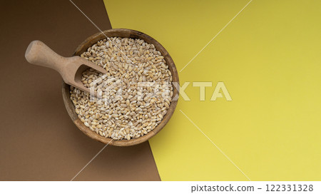 Raw pearl barley porridge Gluten free cereals. Health gut benefits. Concept of alternative whole spelt grain ingredient. Vegetarian diet recipes. Plant-based lifestyle. Copy space Protein rich Raw pearl barley porridge Gluten free cereals. Health gut benefits. Concept of alternative whole spelt grain ingredient. Vegetarian diet recipes. Plant-based lifestyle. Copy space Protein rich 122331328