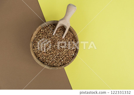 Raw buckwheat porridge Gluten free cereals. Health gut benefits. Concept of alternative whole spelt grain ingredient. Vegetarian diet recipes. Plant-based lifestyle. Copy space Protein rich 122331332