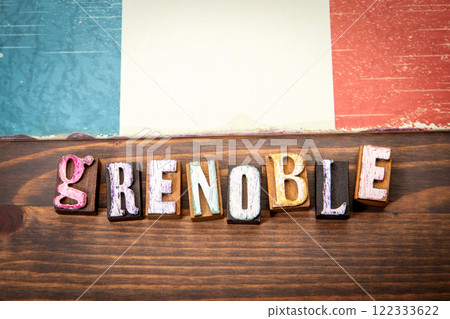 GRENOBLE Flag and alphabet letters on wooden texture background GRENOBLE Flag and alphabet letters on wooden texture background 122333622