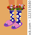 Trendy vertical illustration of legs in colorful socks with fried egg yolk patterns and flowers inside. Set on a sandy background with rays, perfect for postcards, Valentines Day, or creative designs 122333680