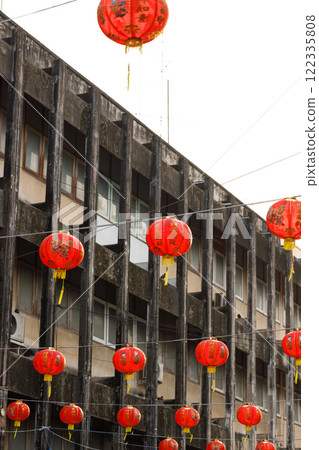 Lunar or Chinese new year lanterns decorated over street in old town. The letters mean Luck, Congratulations, Blessing and Happiness 122335808
