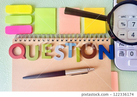 Question letter and magnifying glass 122336174