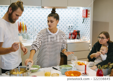 A Celebration of Family Cooking Together in a Bright and Contemporary Kitchen Space A Celebration of Family Cooking Together in a Bright and Contemporary Kitchen Space 122336645
