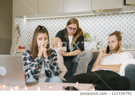 Cherishing Family Bonding Moments During a Beautifully Relaxing Evening at Home Together 122336791