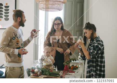 Enjoying a Delightful Family Gathering at Home for Festive Decoration Activities and Fun 122337091