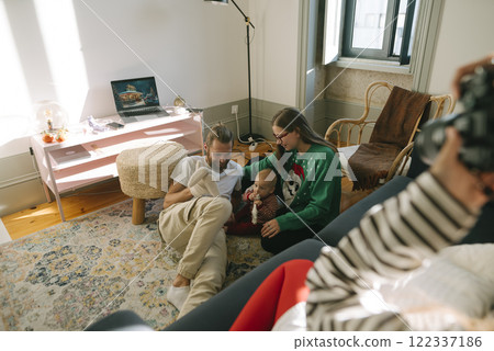 Cherished Family Bonding Moments Captured Within a Cozy and Inviting Living Room Space 122337186