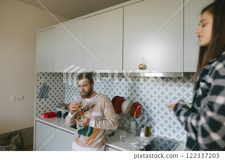 Embracing Cozy Kitchen Moments with Friends, Family, and our Beloved Pets Each Day 122337203