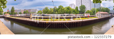 Embankment of the Spree River in the historical part of Berlin on a sunny day. Germany. Embankment of the Spree River in the historical part of Berlin on a sunny day. Germany. 122337279