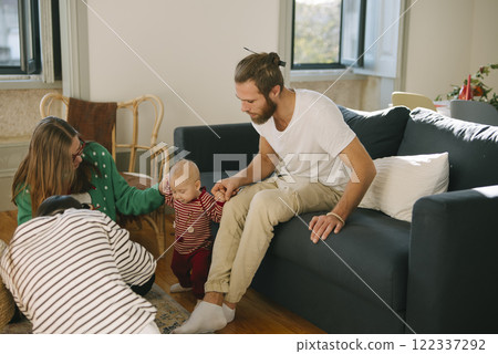 Cherishing Family Bonding Moments with the Baby in the Comfort of Our Home Environment Cherishing Family Bonding Moments with the Baby in the Comfort of Our Home Environment 122337292