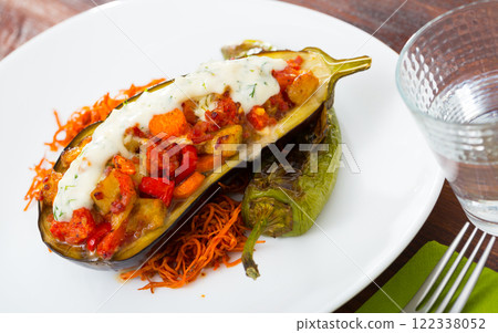 Tasty eggplant stuffed with vegetables 122338052