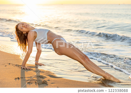 Sexy and beautiful girl in the beach next to sea Sexy and beautiful girl in the beach next to sea 122338088