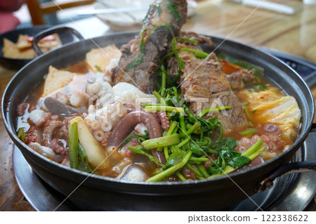 Korean health food made by boiling octopus and ribs together Korean health food made by boiling octopus and ribs together 122338622