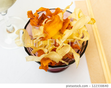 Delicious Yuca chips and Boniato Delicious Yuca chips and Boniato 122338640