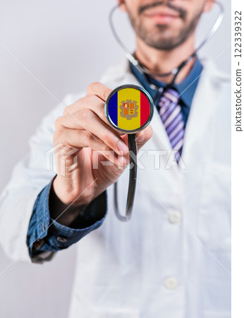 Andorra health and medical insurance concept. Andorra Healthcare System, doctor holding stethoscope Andorra health and medical insurance concept. Andorra Healthcare System, doctor holding stethoscope 122339322